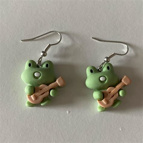 Frog with a guitar Earrings! Green frogs with... - Depop