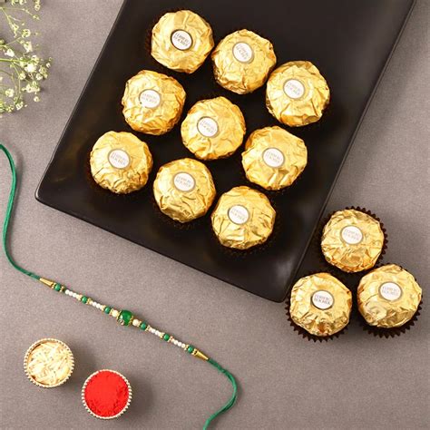 Send Sneh Fancy Green Rakhi and 16 Pcs Ferrero Rocher Online - RKH22 ...