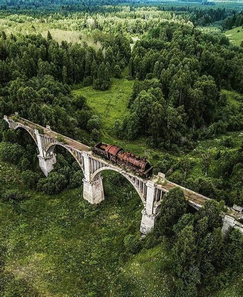 This abandoned railroad track with train still on it : r ...