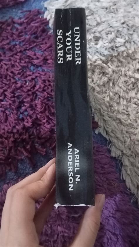 UNDER YOUR SCARS - booksecondstory.com