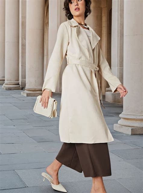 Buy Women Solid Belted Trench Coat Online at just Rs. 2299.0 ...