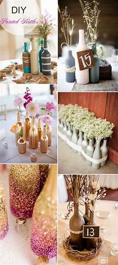 Diy Wedding Decor Ideas You Need To See by Diy Painted Bottles Wedding Centerpieces With Flowers And Diy Wedding Decor Ideas You Need To See