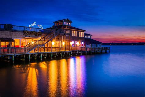 Solomon's Pier Restaurant reflecting in the Patuxent River at sunset ...