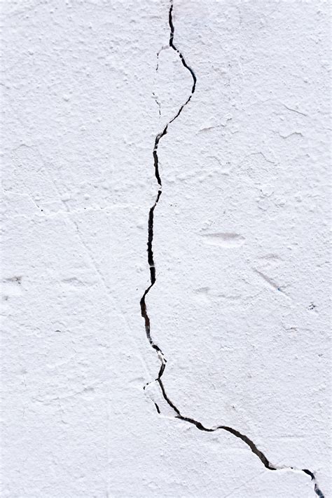 Stucco Cracks? Water Intrusion Is Not Far Behind | Ai Restoration