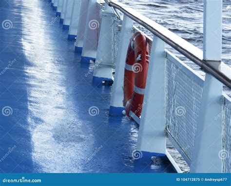 Life Preserver on the Rail of a Cruise Ship Stock Image - Image of ...