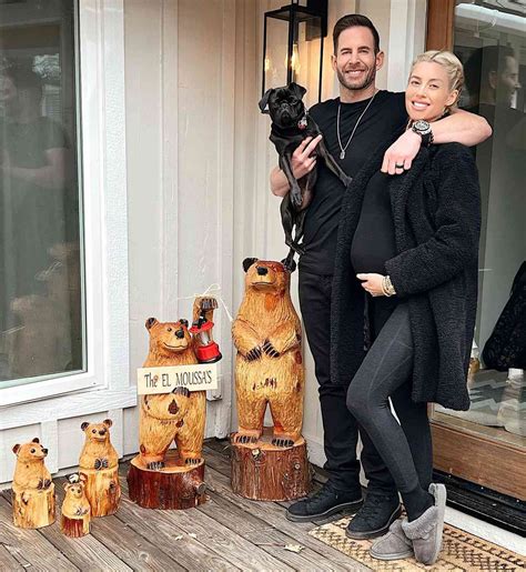 Heather Rae El Moussa and Tarek El Moussa Pose with Wooden Baby Cubs