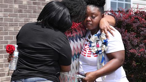 People gather at Breonna Taylors make shift memorial in Injustice Square Park in downtown Louisville