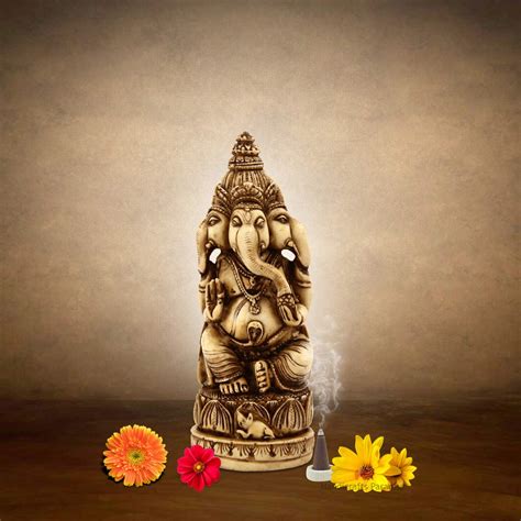 Buy Handicrafts Paradise Resin Three Faced Round Ganesha Showpiece ...