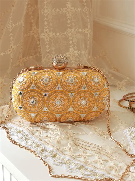 Inaara Peach Oval Clutch