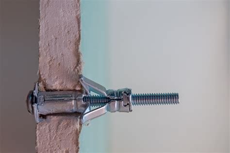 How to Use Drywall Anchors to Hang and Mount Objects | Angi