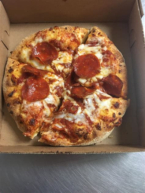 A mini pizza in a pedestal : r/Dominos
