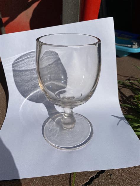 Can anyone help me identify this heavy uranium glass goblet? Any info appreciated, thanks all ...