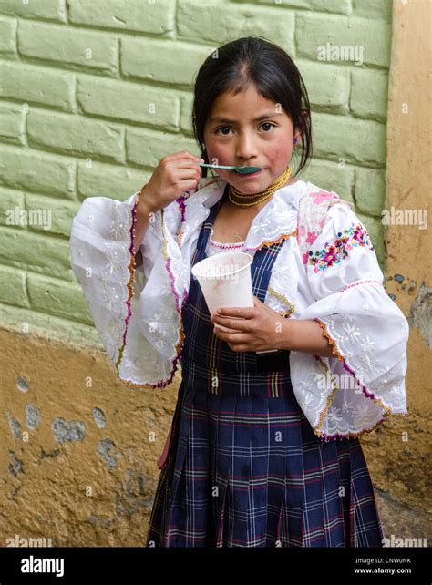 Girl wearing traditional Ecuadorian costume at Otavalo market Ecuardor ...
