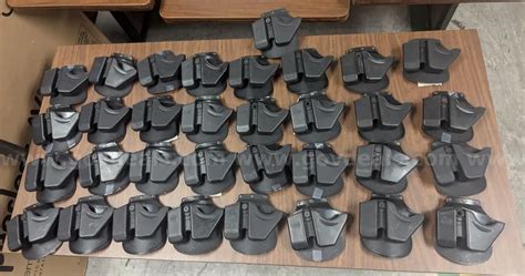 Lot of 33 FOBUS Combo Cuff/Mag Pouches | GovDeals