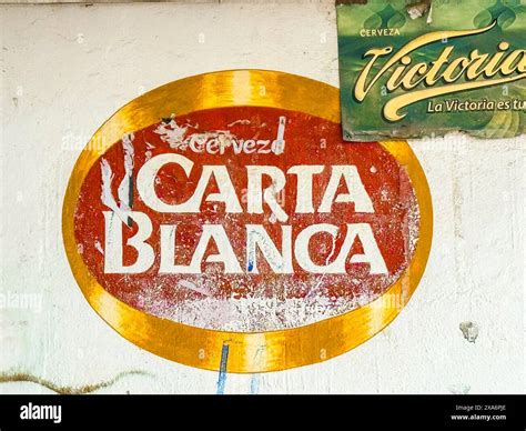 Mexican cantina with the wall painted with the Carta Blanca beer logo ...