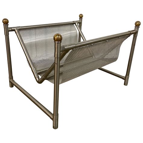 Mid-Century Modern Chrome Sling Magazine Holder at 1stDibs