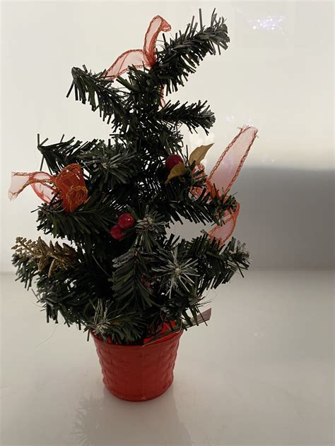 SMALL CHRISTMAS TREE IN POT.287012 - The Christmas Shop