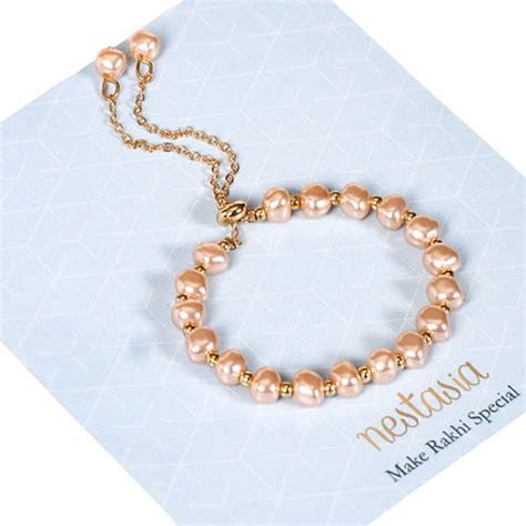 Pearly Peach Rakhi Lumba Hamper Set Of 4 With Gift Box Online - Premium ...