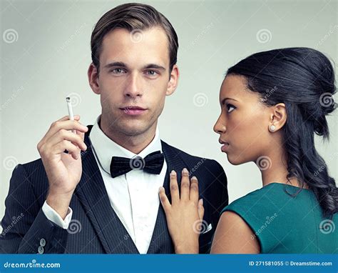 Caught in His Web. a Portrait of a Dapper Young Man and His Girlfriend ...