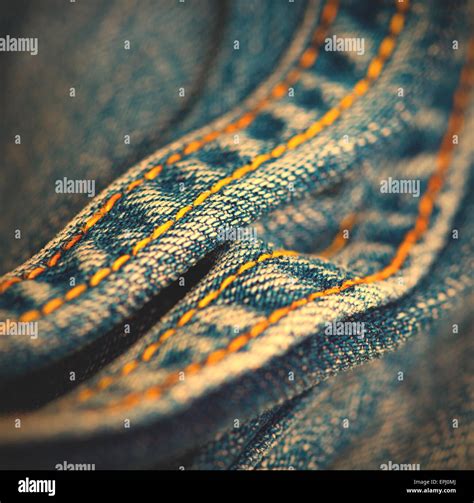 Jeans with yellow stitching thread Stock Photo - Alamy