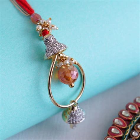 Send Elegant Lumba Rakhi for Bhabhi Online | Rakhibazaar.com
