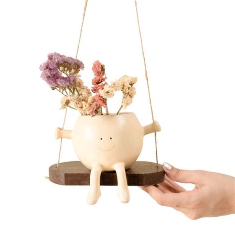 Elegant swing planter – https://artecasa.in/