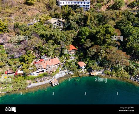 Aerial photograph of San Marcos la Laguna, Guatemala on a beautiful ...