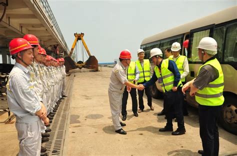 电力行业中央企业代表一行参访国投湄洲湾港-