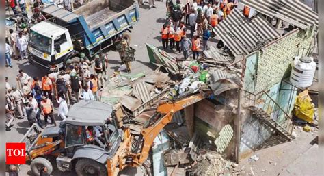 Common thread: Bulldozers after communal clashes | Delhi News - Times ...