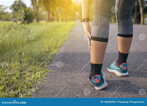 Woman Suffering from Pain in Leg or Shin Injury after Running Jogging Sport Exercise and Workout ...