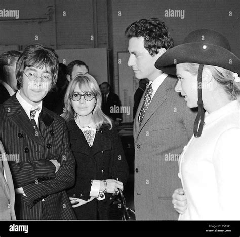 Beatles files 1967 John Lennon Cynthia at London motor show talking to ...