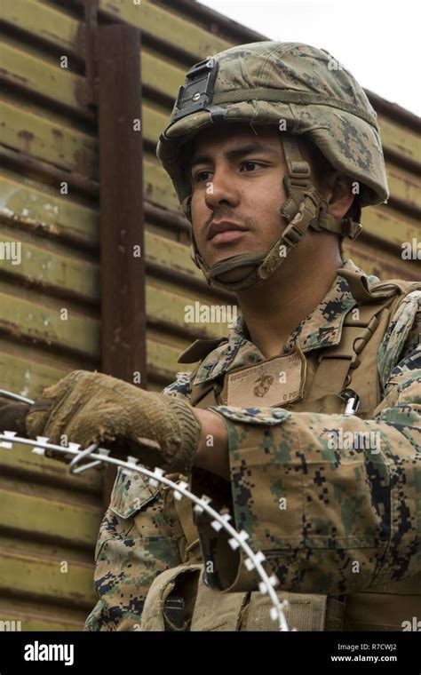 U.S. Marine Corps Lance Cpl. Luis Urquizu, a combat engineer with 7th ...