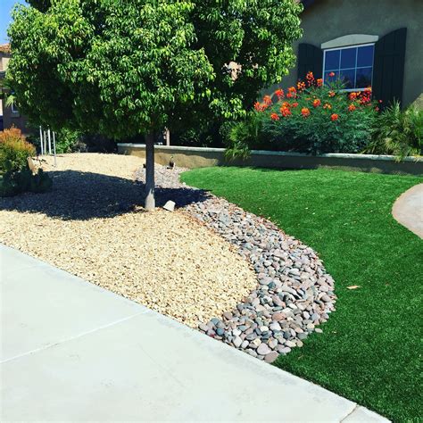 Artificial Turf and Rock Design for Front Yard Landscaping