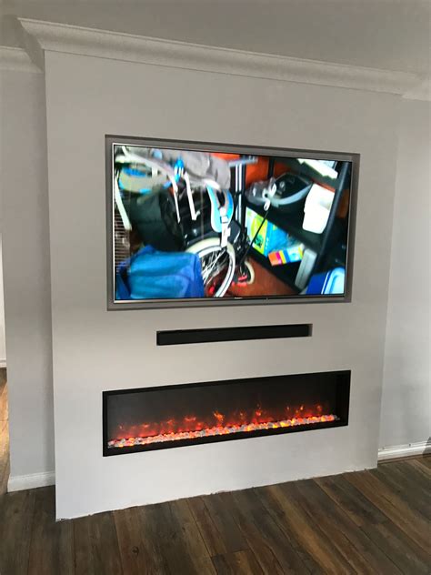 Tv Mounted Above Fireplace