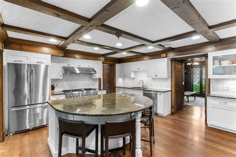 Tudor with slate roof, stained glass stands out in Pepper Pike: House ...