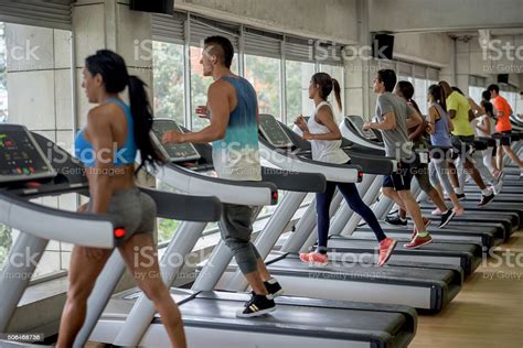 People Exercising At The Gym Stock Photo - Download Image Now - iStock