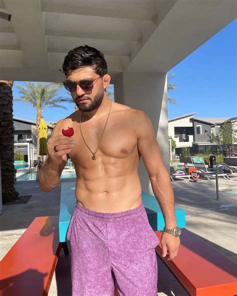 Download Arman Tsarukyan Eating A Strawberry Wallpaper | Wallpapers.com