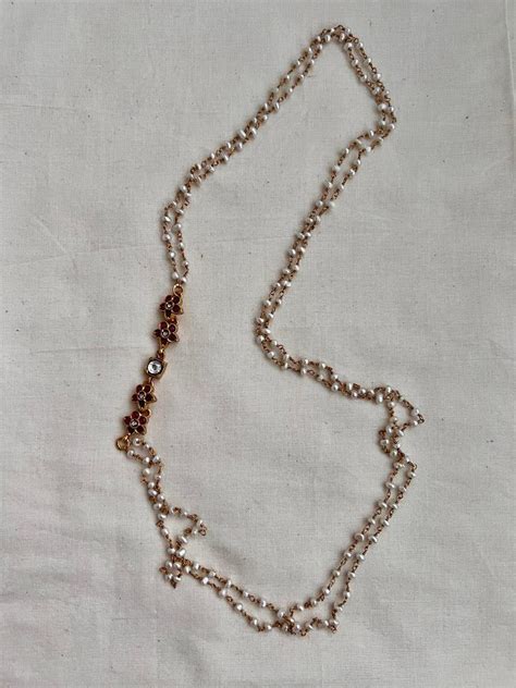Gold polish kundan & ruby side mope with pearls chain | House of Taamara