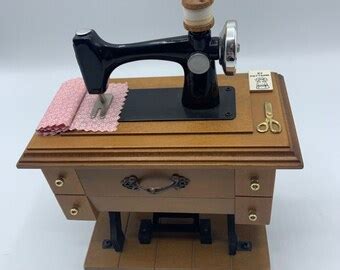 Image result for Sewing Machine Music Box Scam