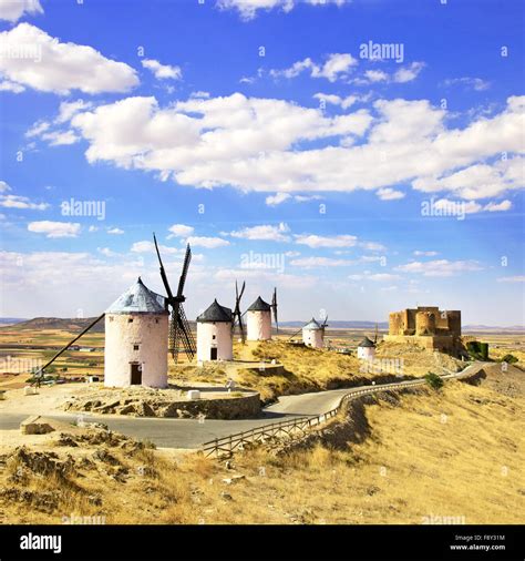 Cervantes Don Quixote windmills and Consuegra castle. Castile La Mancha, Spain, Europe Stock ...