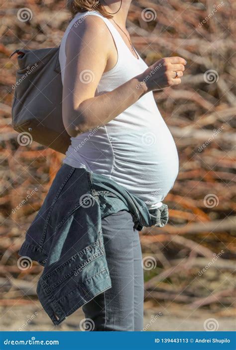 Pregnant Girl with Big Belly in the Nature Stock Image - Image of ...