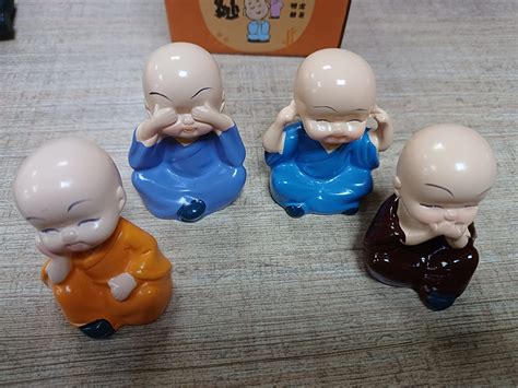 Buy TRNSFORM Four Monks Polyresin Buddha Idol Decorative Showpiece ...
