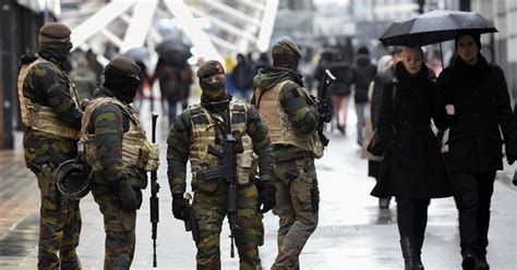 Paris attacks: Belgium police arrest five more suspects in raids