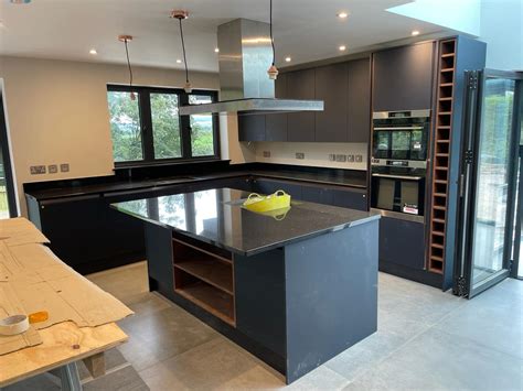 https://kevcoconstruction.co.uk/wp-content/uploads/2024/03/High-End-Kitchen-Installation-Prestatyn-North-Wales2.jpg?utm_source=chatgpt.com