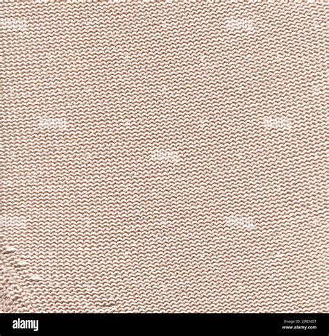 Knitted cozy faded beige texture flat lay. Cream colored sweater ...