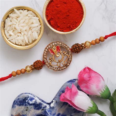 eCraftIndia Lord Ganesha with Rudraksha Religious Designer Rakhi with