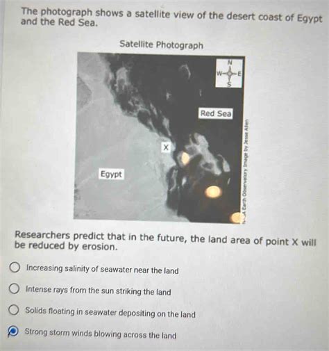 The photograph shows a satellite view of the desert coast of Egypt and ...