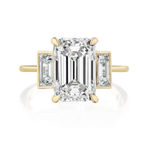 Emerald Cut Diamond Engagement Ring with Bezel Set Baguette Side Stone