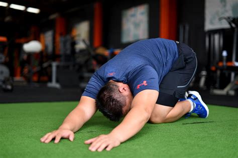 Kneeling Left Lat Stretch. It is the same move as the upper back ...