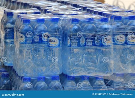 Rows of Plastic Water Bottles Stacked in Bulk for Sale. Editorial Photo ...